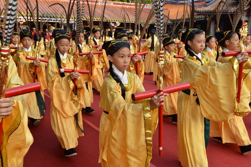 Students performing ceremonial rituals